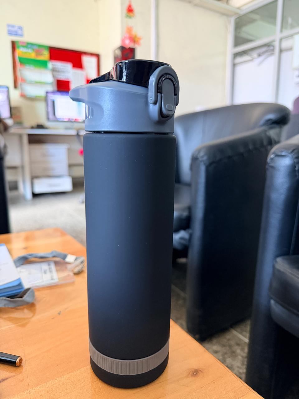 PLASTIC SPORTS WATER BOTTLE WITH PIPE AND LOCK FEATURE